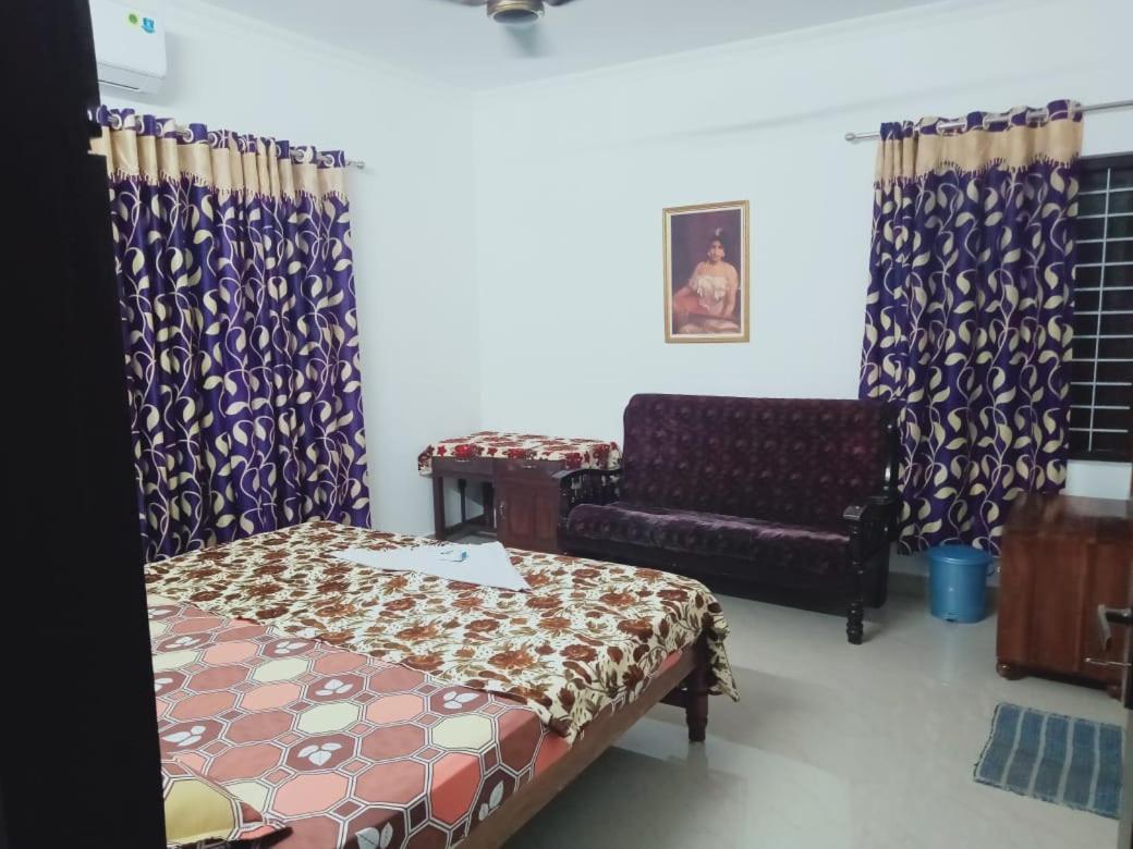 Karma Homestay Mundrothuruth Bilik gambar